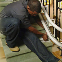 HandiLift technician installing a home lift